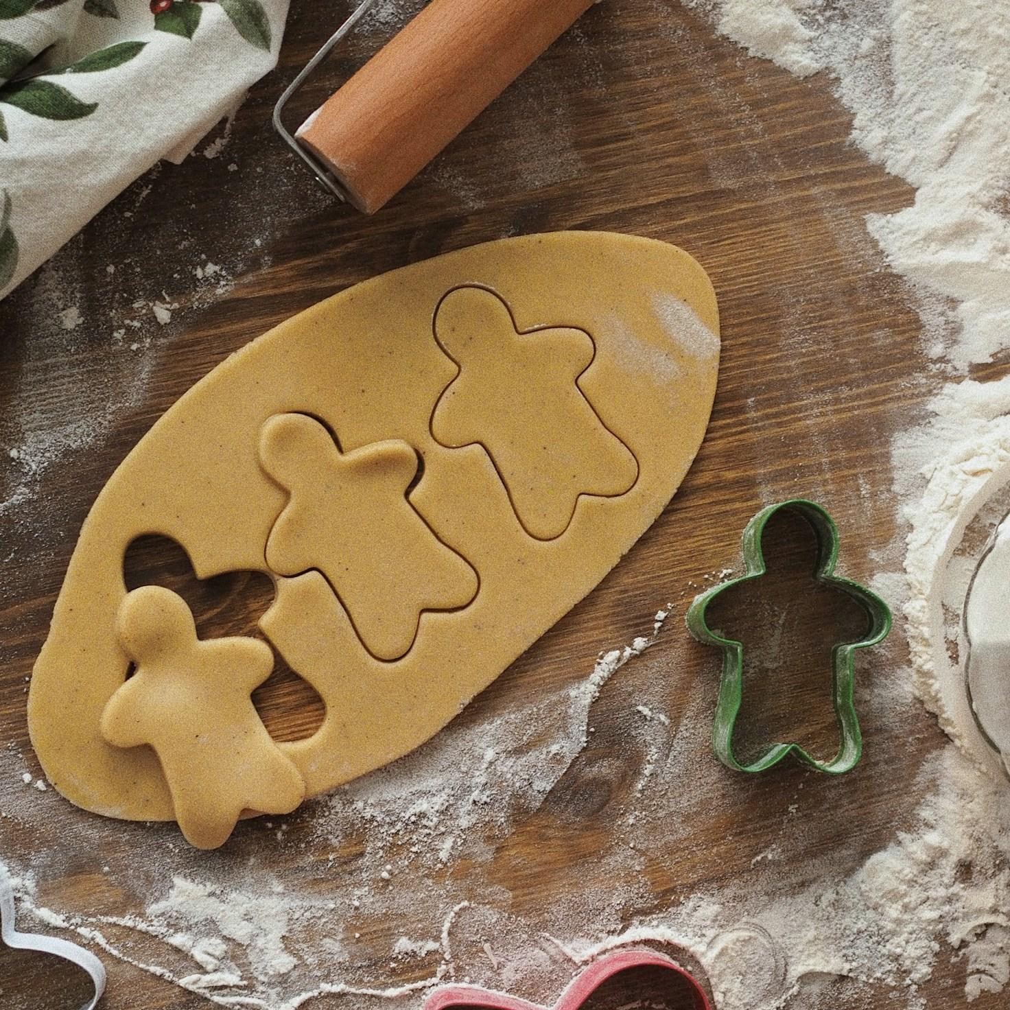 Diverse group of community members sharing a meal together, showcasing the social bonds formed through collaborative cooking